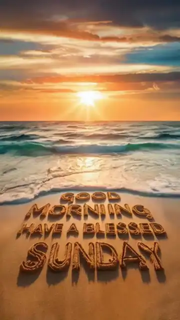 Animated GIF: 'GOOD MORNING HAVE A BLESSED SUNDAY' written in sand on a beach, waves and a sunrise.